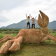 Illustration for article titled Straw Dinosaurs Appear in Japanese Fields, Try To Eat Humans